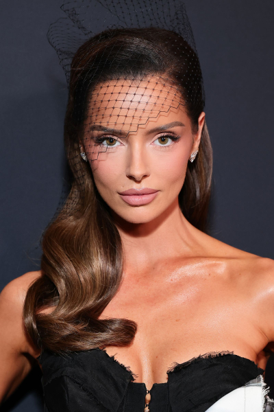 MARCH 13 Maura Higgins attends the 19th Annual Women In Film Oscar Nominees Celebration wearing a black face veil and...