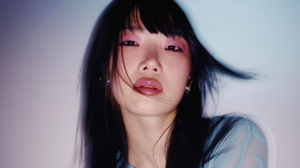 Image may contain Head Person Face Black Hair Hair Adult Photography Portrait Cosmetics Lipstick and Body Part